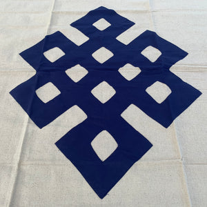 Table cloth square dark blue endless knot close up