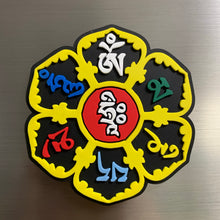 Load image into Gallery viewer, A colorful lotus-shaped magnet with the mani mantra written in various colors on its petals.